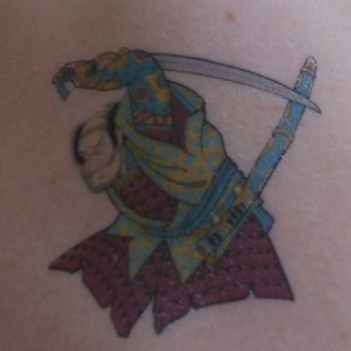 A Samurai Tattoo on my shoulder - The samurai warrior Egara no Heita battling a Giant Serpent